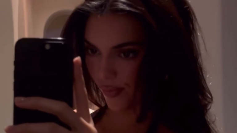 Kendall Jenner wears a super low-cut dress during winter vacation in Aspen – See photos